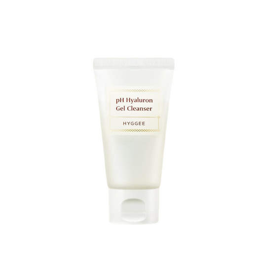 HYGGEE pH Hyaluron Gel Cleanser is a gentle, hydrating cleanser formulated to maintain your skin's natural balance. Featuring Sodium Hyaluronate and a blend of nourishing oils like Evening Primrose, Jojoba, and Meadowfoam, it effectively cleanses without stripping moisture. Infused with Centella Asiatica Extract and Chamomile Flower Extract, this cleanser soothes and calms the skin, making it ideal for sensitive types. Its low-pH formula supports the skin barrier while leaving your skin soft, clean, an