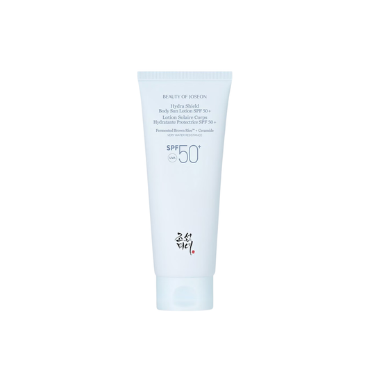 BEAUTY OF JOSEON Hydra Shield Body Sun Lotion is a lightweight SPF 50+ PA++++ body sunscreen that provides strong UV protection with a fresh, hydrating finish. Formulated with Fermented Brown Rice to nourish and refresh the skin and Ceramide NP to support the moisture barrier, it helps keep skin comfortable and hydrated throughout the day. The smooth lotion texture absorbs quickly without a sticky feel or visible white cast, leaving skin soft with a natural glow. Suitable for normal, dry, dehydrated, combin
