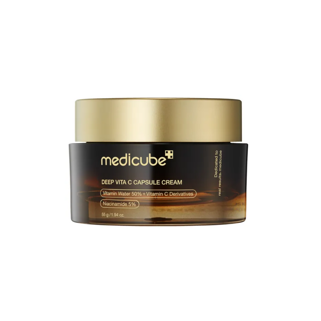 MEDICUBE Deep Vita C Capsule Cream is a potent brightening and nourishing cream infused with stabilized Vitamin C derivatives and Hippophae Rhamnoides Water to deliver intense hydration, improve skin tone, and enhance radiance. Enriched with Niacinamide, Alpha-Arbutin, and Ferulic Acid, this cream targets dullness, uneven skin tone, and pigmentation while supporting collagen production for firmer skin. Sodium Hyaluronate and Tocopherol (Vitamin E) deeply hydrate and protect the skin barrier, leaving your sk