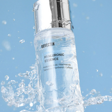 Load image into Gallery viewer, ROVECTIN Aqua Hydration Hyaluronic Essence is a hydrating serum designed to deeply moisturize and rejuvenate the skin. It features multiple forms of Hyaluronic Acid for intense hydration, Niacinamide for skin brightening, and natural extracts like Licorice and Centella Asiatica to soothe and improve skin tone. Ideal for all skin types, this essence promotes a healthy, glowing complexion.