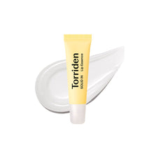 Load image into Gallery viewer, TORRIDEN SOLID IN Ceramide Lip Essence is a nourishing lip treatment designed to hydrate and protect dry, chapped lips. Formulated with Ceramide NP, Shea Butter, and Jojoba Oil, it provides deep moisture and helps restore the skin barrier. Enriched with Panthenol, Trehalose, and Sodium Hyaluronate, this lip essence locks in hydration, leaving lips soft and smooth. The lightweight, non-sticky texture makes it perfect for daily use, keeping your lips moisturized and healthy.