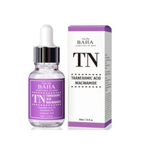 Load image into Gallery viewer, COS DE BAHA (TN) Tranexamic Acid 5% + Niacinamide 5% Serum is a powerful brightening and skin-tone correcting serum designed to reduce hyperpigmentation and improve overall skin clarity. Formulated with 5% Tranexamic Acid and 5% Niacinamide, it helps fade dark spots, even out the complexion, and reduce redness. Enriched with Aloe Vera, Sodium Hyaluronate, and Allantoin, this serum also provides hydration and soothes irritated skin. Botanical extracts like Green Tea and Edelweiss further enhance the skin&#39;s r