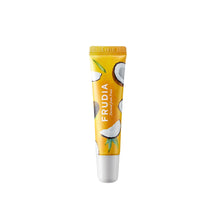 Load image into Gallery viewer, FRUDIA Coconut Honey Salve Lip Cream is a deeply nourishing lip treatment formulated with Coconut Water and Honey Extract to provide intense hydration and soothe dry, chapped lips. Enriched with Shea Butter and a blend of natural oils like Grape Seed, Apricot Kernel, and Mango Seed, it creates a protective barrier that locks in moisture for long-lasting comfort. The addition of Propolis Extract and Ceramides helps repair and strengthen the lips, while Vitamin E offers antioxidant protection. Perfect for kee