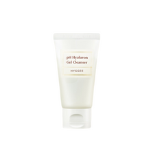 Load image into Gallery viewer, HYGGEE pH Hyaluron Gel Cleanser is a gentle, hydrating cleanser formulated to maintain your skin&#39;s natural balance. Featuring Sodium Hyaluronate and a blend of nourishing oils like Evening Primrose, Jojoba, and Meadowfoam, it effectively cleanses without stripping moisture. Infused with Centella Asiatica Extract and Chamomile Flower Extract, this cleanser soothes and calms the skin, making it ideal for sensitive types. Its low-pH formula supports the skin barrier while leaving your skin soft, clean, an