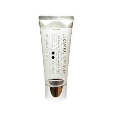 MISSHA Ceramide Capsule Hand Cream is a deeply hydrating and nourishing hand cream infused with Ceramide NP and Hydroxypropyl Bispalmitamide MEA to strengthen the skin barrier and lock in moisture. Enriched with Cocoa Seed Butter and Avocado Oil, it delivers a silky, non-greasy finish while softening and soothing dry hands. The lightweight formula absorbs quickly, leaving hands feeling smooth, protected, and delicately scented. Perfect for daily use to keep your hands moisturized and pampered.