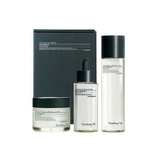 PYUNKANG YUL Calming Line Gift Set is a complete soothing routine designed to calm, hydrate, and strengthen sensitive or acne-prone skin. This 3-step set includes a gentle exfoliating toner, a barrier-supporting serum, and a moisturizing cream to help control excess oil while delivering deep hydration. Formulated with Centella Asiatica, Ceramide, Hyaluronic Acid, and Tea Tree Extract, it helps soothe irritation, improve skin texture, and support a healthy skin barrier. Perfect for those looking to restore b