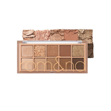 ROMAND Better Than Palette #02 Mahogany Garden offers a rich collection of warm, mahogany-inspired shades that add depth and sophistication to any makeup look. Featuring a mix of matte, shimmer, and glitter finishes, this palette allows you to create both everyday natural styles and bold, statement eye looks. The silky, blendable formula ensures smooth application and long-lasting wear, making it a perfect choice for enhancing your beauty routine with timeless elegance.