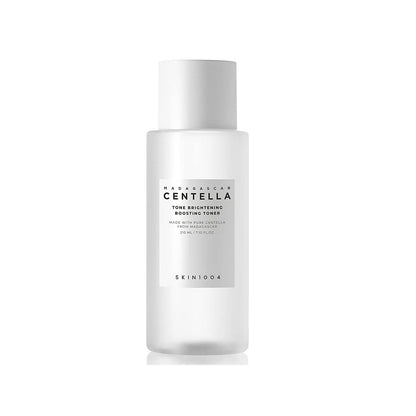 SKIN1004 Madagascar Centella Tone Brightening Boosting Toner is a hydrating and brightening toner formulated with Centella Asiatica Extract to soothe and calm the skin. Enriched with Niacinamide and 2-O-Ethyl Ascorbic Acid, it helps brighten the complexion and improve skin tone. The addition of fruit extracts like Apple, Papaya, and Grape provides gentle exfoliation and nourishment, leaving the skin smooth and revitalized. This toner prepares the skin for better absorption of the following skincare steps wh